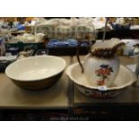 A cream ground, floral Bedroomware Jug and Bowl and another non-matching bowl.