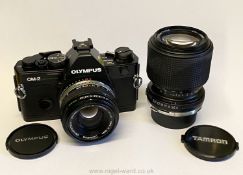An Olympus OM-2 Spot/Program 35mm SLR Camera with Olympus Zuiko Auto-S 50mm f/1.