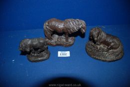 Three Shetland Pony figures.