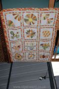 A hand-made Patchwork Quilt for a little girl, some stitching loose but very pretty.
