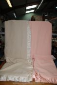 Two double pure wool blankets:one pink by Jonelle and one beige by Witney.