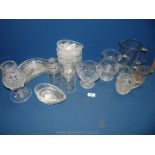 Miscellaneous glass including jugs, avocado dishes, storage jars with lids, bonbon dish,