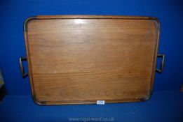 A large wooden Tray with copper enforced corners and handles, 25 3/4'' long including handles,