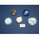 Five Paperweights, two with lace detail, one with white flower detail and two others.