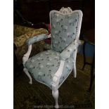 An open arm Elbow Chair with cream painted frame and sheep illustrated upholstery