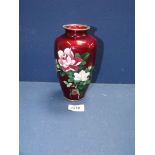 Ando Jubei: A fine ginbari cloisonne Vase, roses against a blood red ground,