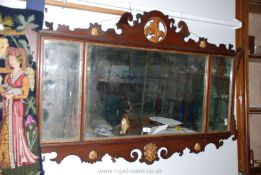 An ornately framed Wall Mirror with scroll top and gilded edges, a/f,