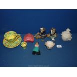 A quantity of china to include multi-coloured cup, saucer and egg cup, wooden peg doll,