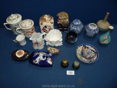 A quantity of china to include oriental chocolate cans with lids, blue and white ginger jars,