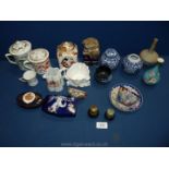 A quantity of china to include oriental chocolate cans with lids, blue and white ginger jars,