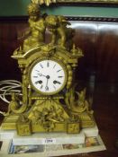 An elegant Ormolu/gilded Mantel Clock having a movement striking on a bell by Japy Freres & C.