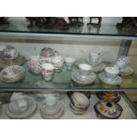A Royal Standard part Teaset in pale blue ground with dark blue roses consisting of five cups and