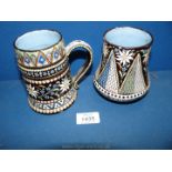 A Thoune pottery Tankard and vase, (chips to base of tankard).