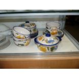 A quantity of Scott's of Stow dinnerware including plates, bowls and serving dishes.