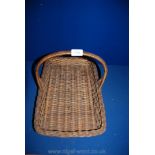 A wicker flower arranger's Basket, 17 1/2'' long x 11'' wide.