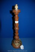 A carved wood Table Lamp with Acanthus leaf and other detail, 20'' tall.