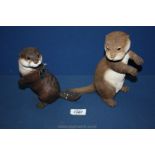 Two Border Fine Arts Otters, hand made in Scotland,