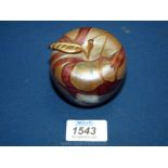 An Alum Bay opaque paperweight in a swirled Apple design, 3'' tall.
