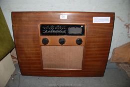 A post WWII Murphy A104 radio with four valves, designed by A.F Thwaite, 18'' x 24'' x 6''.