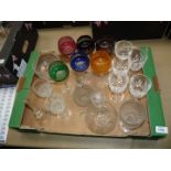 A quantity of glasses including six coloured hock glasses, cut glass wine glasses,