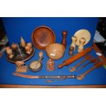 A quantity of Treen including bowls, Buddha, Lazy Susan, condiments, rolling pin, egg cups,