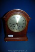 A Mahogany cased Bracket Clock with two train movement by Astral of Coventry, striking on a gong,