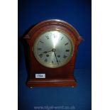 A Mahogany cased Bracket Clock with two train movement by Astral of Coventry, striking on a gong,