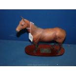 A Beswick Connoisseur series model of Arkle, 11 1/4'' long x 12'' tall.