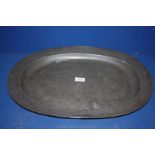 A large, heavy Pewter oval Platter,