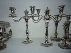 A pair of very nice silver plated Candelabra with crossed arms, one a/f, 16 1/2'' tall.