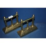 A pair of Brass Fire Dogs,