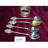 Three silver Ross Golf Club spoons, Birmingham 1939, a Canadian Silver and enamel Spoon,