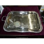 A silver plated two handled Tray having embossed centre, 24" x 15".
