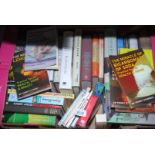 A box of books: novels, cookery,
