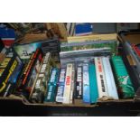 A box of novels including Andy McNab, Jack Higgins and gardening books.