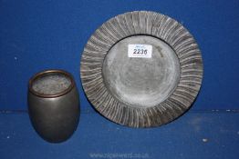 A Svenks Tenn pewter Plate with curved rib detail to the rim,