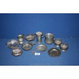 A small quantity of small Pewter to include a porringer with fleur-de-lys to centre and shell