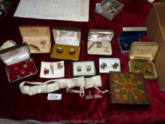 Miscellaneous cufflinks, etc. and a small wooden links box.