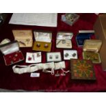 Miscellaneous cufflinks, etc. and a small wooden links box.