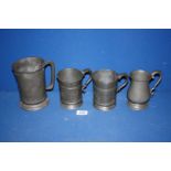 A quantity of miscellaneous Pewter Tankards including two pint tankards (dented) with marks,
