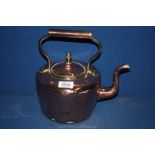 A small Copper Kettle with acorn finial, 10 1/2'' tall.