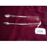 A pair of Victorian Silver sugar Tongs, London 1859.