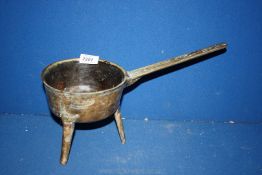A bronzed three legged Pot marked 'Bailey & Street' on handle,
