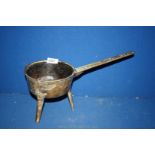 A bronzed three legged Pot marked 'Bailey & Street' on handle,