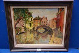 An Oil on canvas of a continental canal scene, signed HAF.