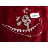 A marcasite brooch and earing set, etc.