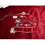 A quantity of vintage costume jewellery including ear rings,