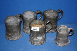Four Pewter pint Tankards and a 1/2 pint tankard,