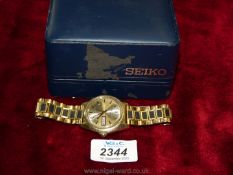 A Seiko gents wristwatch with box, G5 Hi beat 36000, gold coloured face with black detail.