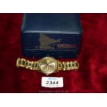 A Seiko gents wristwatch with box, G5 Hi beat 36000, gold coloured face with black detail.